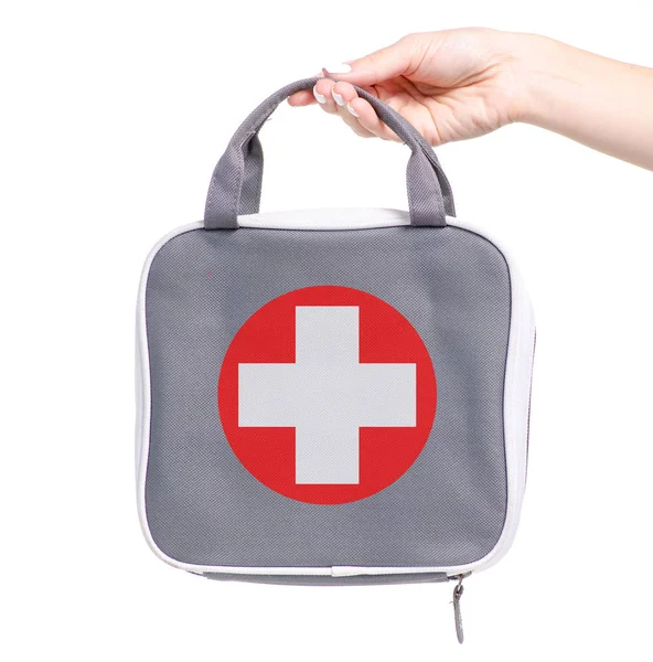 First-aid kit bag in hand — Stock Photo, Image