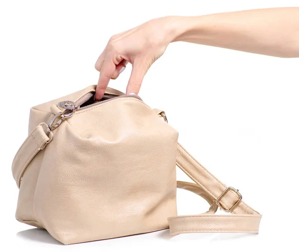 Female beige leather bag in hand — Stock Photo, Image