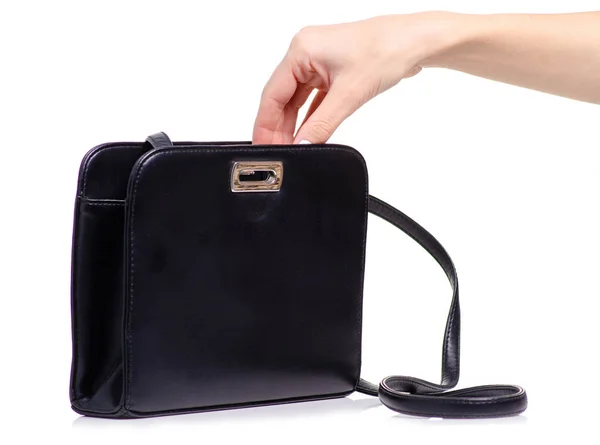 Borsa donna in pelle nera in mano — Foto Stock