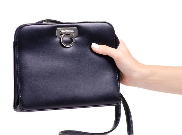 Female black leather bag in hand — Stock Photo, Image