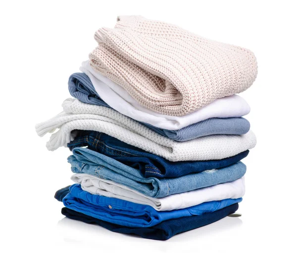Stack of clothing jeans sweaters — Stock Photo, Image