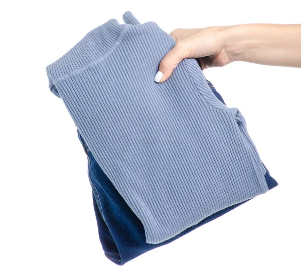 Stack Clothing Blue Jeans Blue Sweaters Hand White Background Isolation — Stock Photo, Image