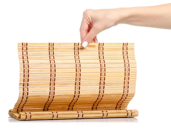Tappeto di bambù naturale in mano — Foto Stock