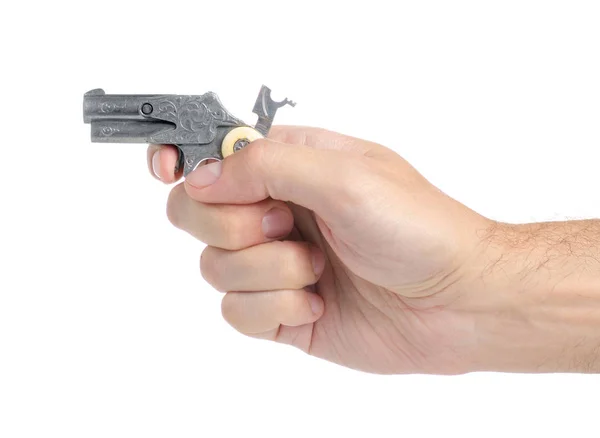 Metal toy gun in hand