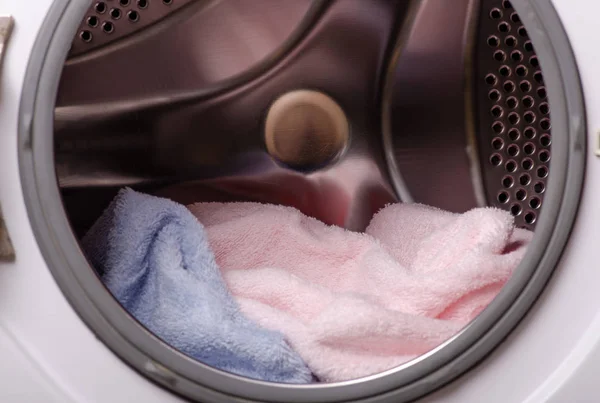 Washing machine drum clothes towels laundry — Stock Photo, Image