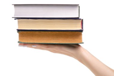 elinde kitap yığını