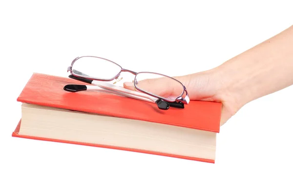 Libros y anteojos para visión en mano — Foto de Stock