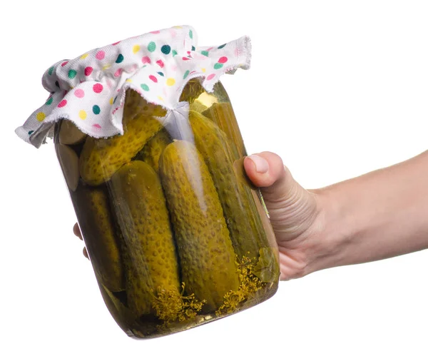 Bank of canned cucumbers in hand — Stock Photo, Image