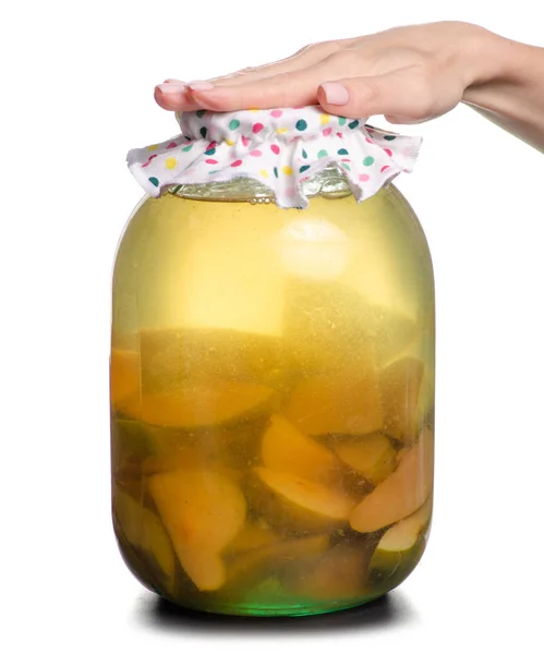 Vaso di pere composte mano femminile — Foto Stock