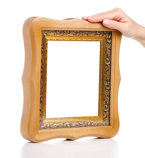 Houten foto frame in de hand — Stockfoto