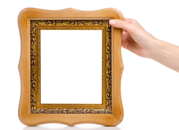 Houten foto frame in de hand — Stockfoto