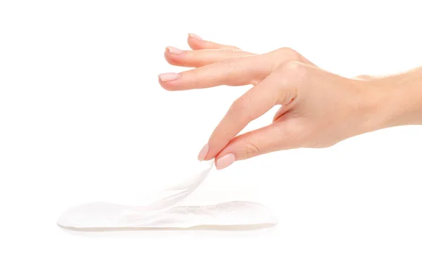 Almohadillas sanitarias menstruación pluma blanca en la mano —  Fotos de Stock
