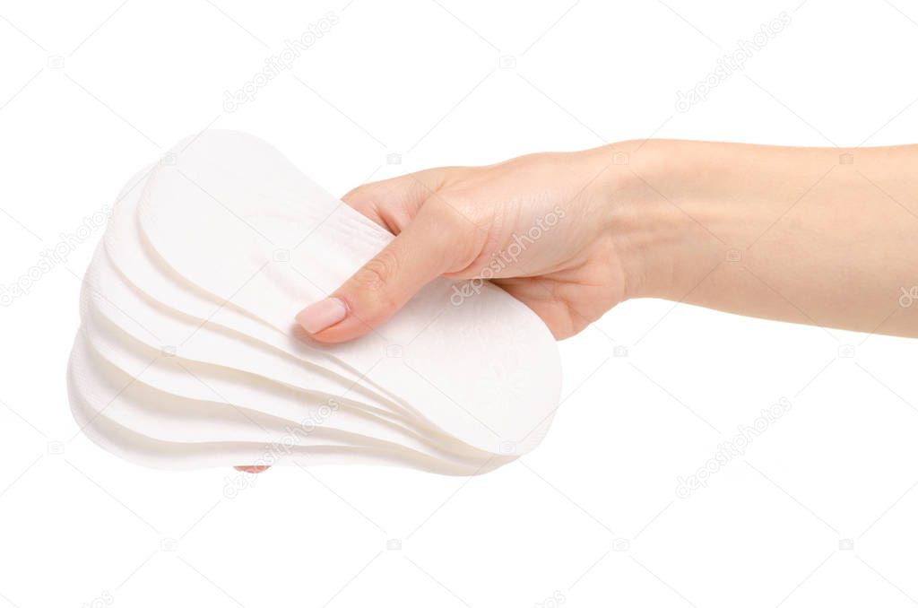 Sanitary pads menstruation white in hand