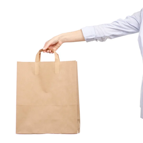 Woman holding a paper bag shopping beauty — Stock Photo, Image