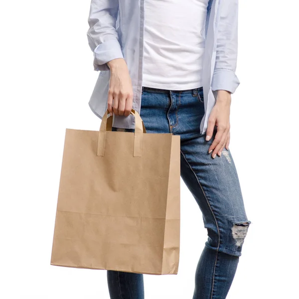 Woman holding a paper bag shopping beauty — Stock Photo, Image