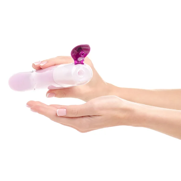 Różowy żel pod prysznic w butelce fioletowy w ręku — Zdjęcie stockowe