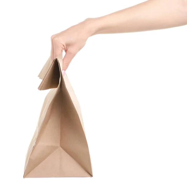 Paper bag package in hand — Stock Photo, Image