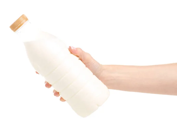 Láhev mléka v rukou — Stock fotografie