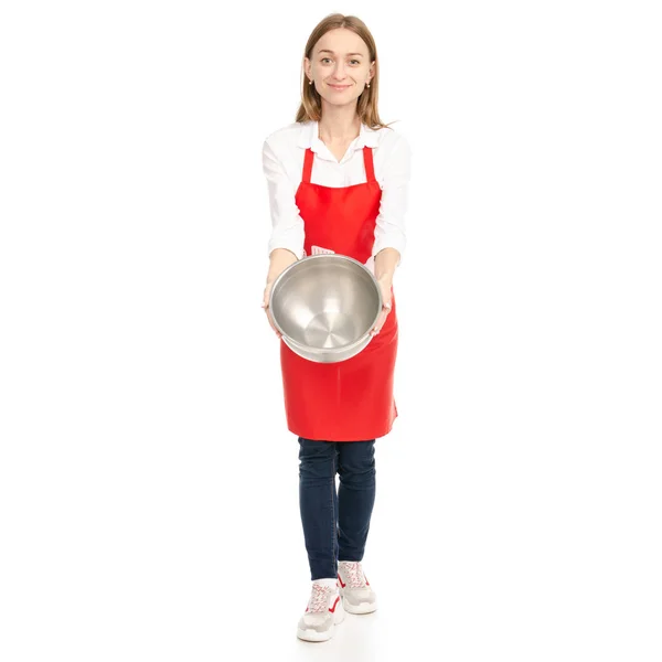 Eine Frau in roter Schürze in der Hand einer Küchenschüssel — Stockfoto