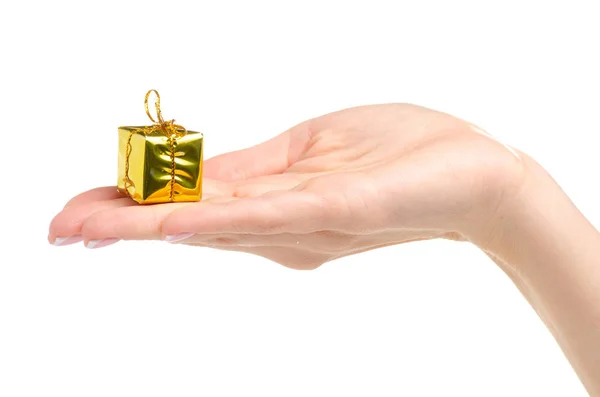 Vánoční dárky hračky zlatý box v ruce — Stock fotografie