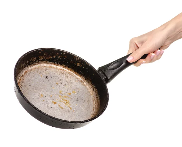 Old dirty fat pan in hand — Stock Photo, Image