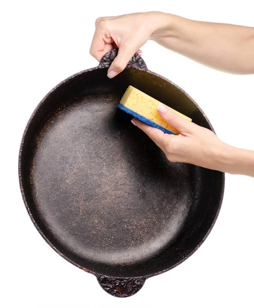 Oude vieze vet pan schone spons in de hand — Stockfoto