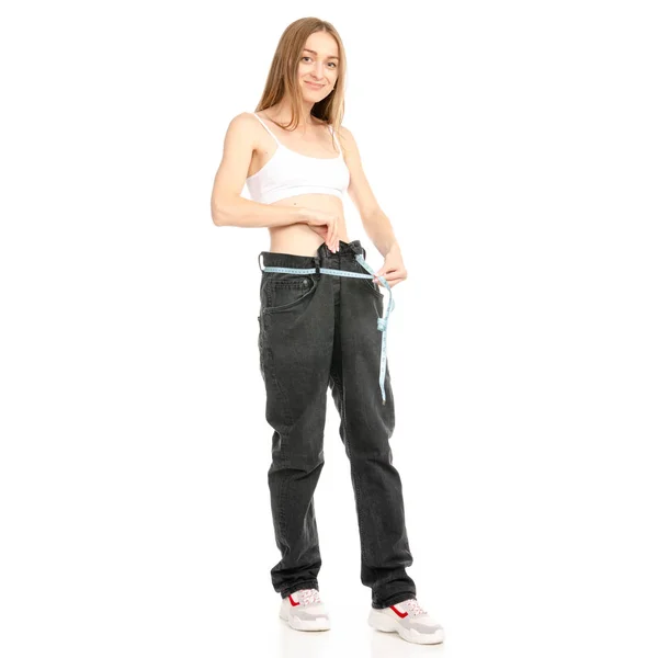 Schöne Frau Gewichtsverlust Zentimeter große Jeans — Stockfoto