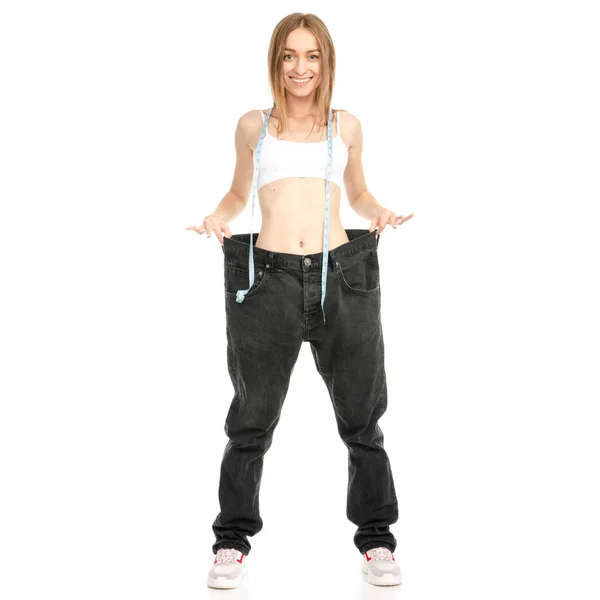 Schöne Frau Gewichtsverlust Zentimeter große Jeans — Stockfoto