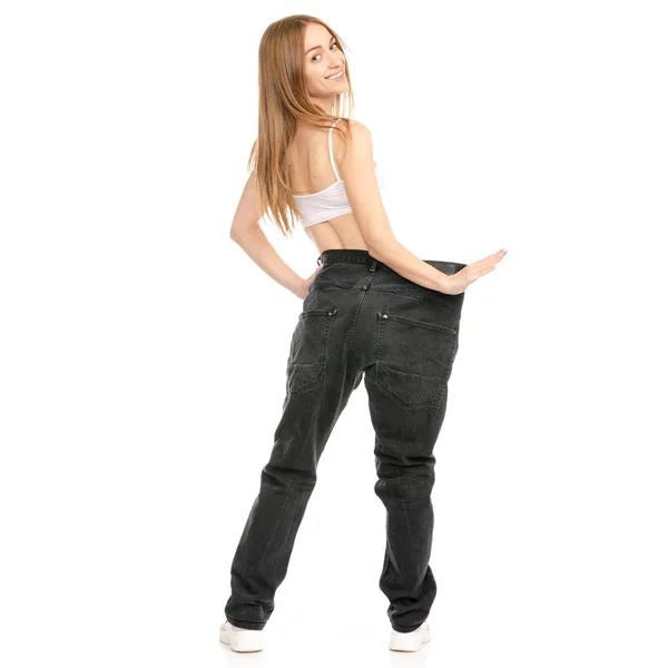 Schöne Frau Gewichtsverlust große Jeans — Stockfoto