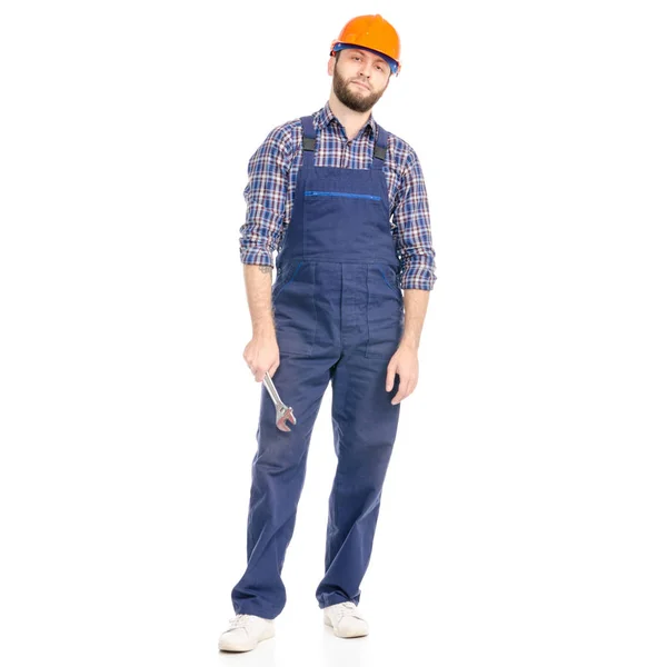 Jonge man bouwer industrie werknemer veiligheidshelm met een Verstelbare moersleutel — Stockfoto