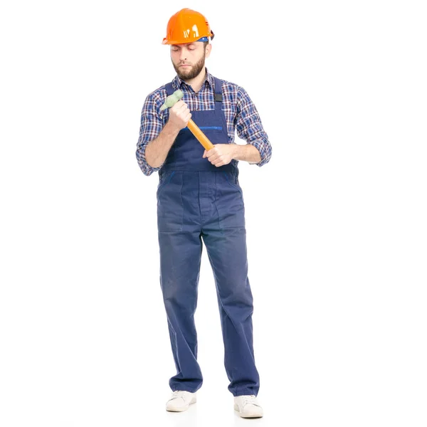 Young man builder industry worker hardhat with a hammer — Stock Photo, Image