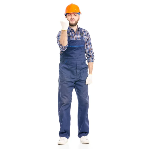 Junger Mann Bauarbeiter Industriearbeiter Hardhat zeigt starke Faust — Stockfoto