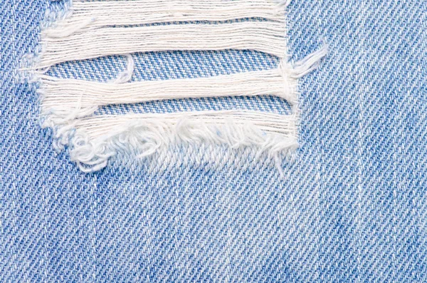 Jeans moda stracciato tessuto trama del filo macro — Foto Stock