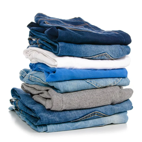 Een stapel van kleding jeans broek — Stockfoto