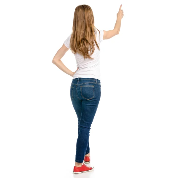 Frau in Jeans und T-Shirt zeigt — Stockfoto