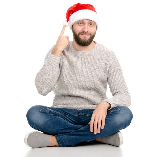En man i jeans tröja med Santa hatt visar positiva känslor glad — Stockfoto