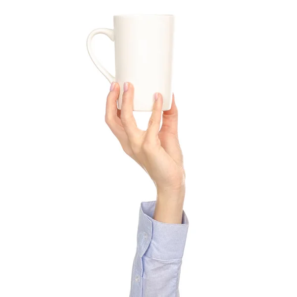 Taza de taza blanca en el brazo de la mano levantado — Foto de Stock