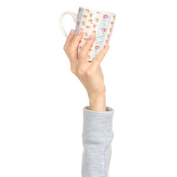 Cup mug blue flower print in hand arm raised up — Stock Photo, Image