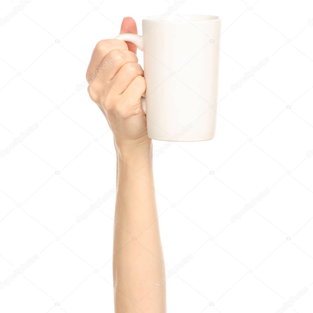 White cup mug in hand arm raised up