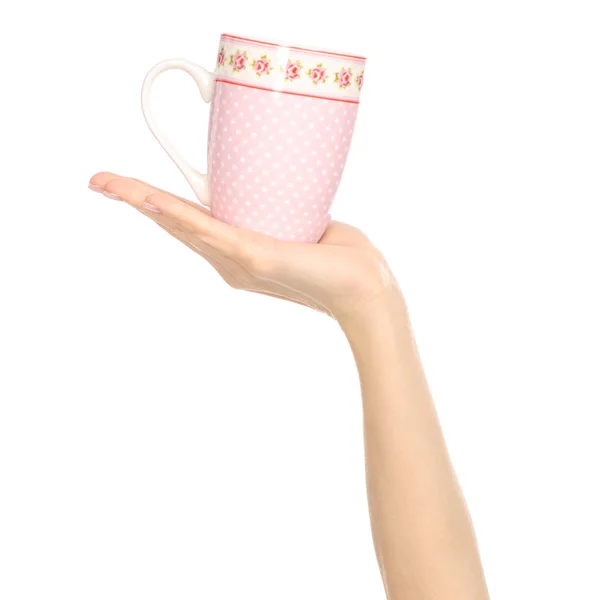 Taza taza rosa flor impresión en mano brazo levantado —  Fotos de Stock