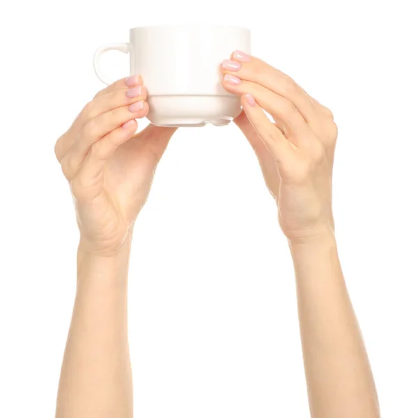 Taza de taza blanca en el brazo de la mano levantado — Foto de Stock