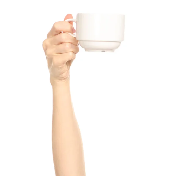 Taza de taza blanca en el brazo de la mano levantado — Foto de Stock