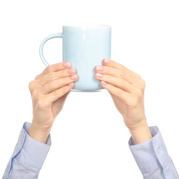 Blue cup mug in hand arm raised up — Stock Photo, Image