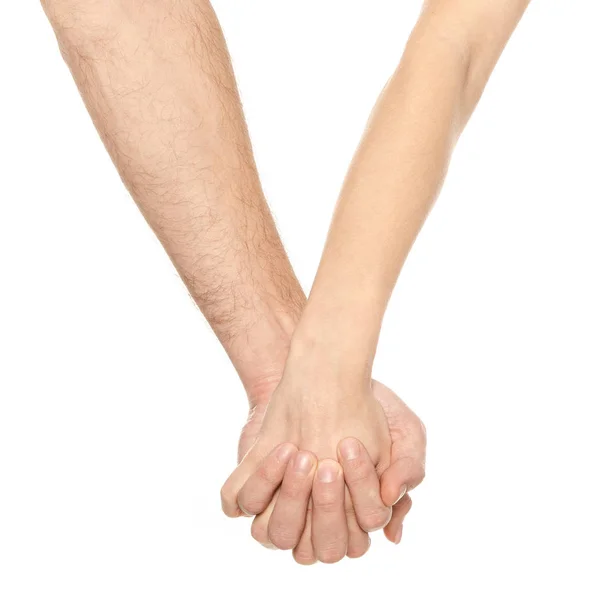 Пара держащихся за руки — стоковое фото