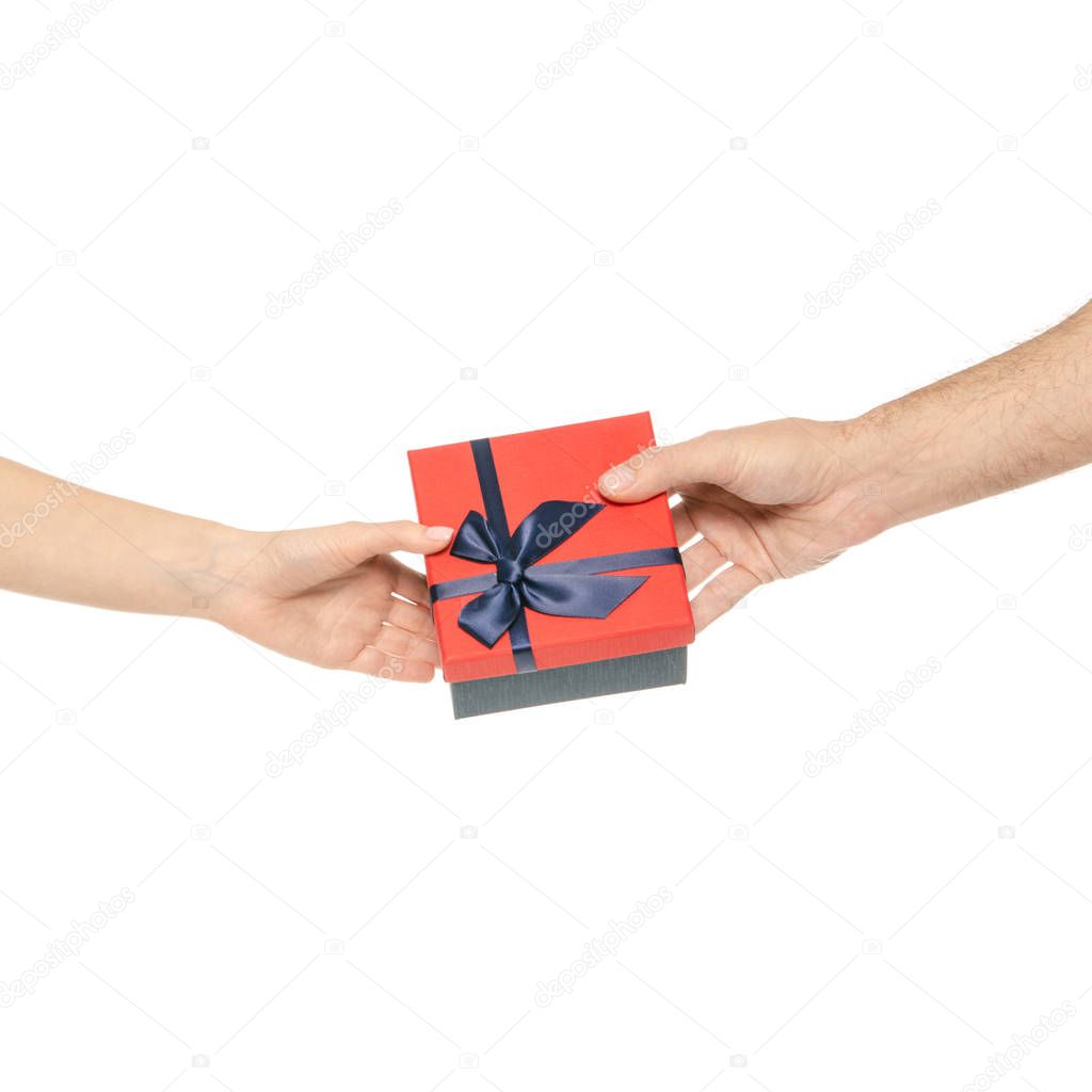 Two hands taking a box gift