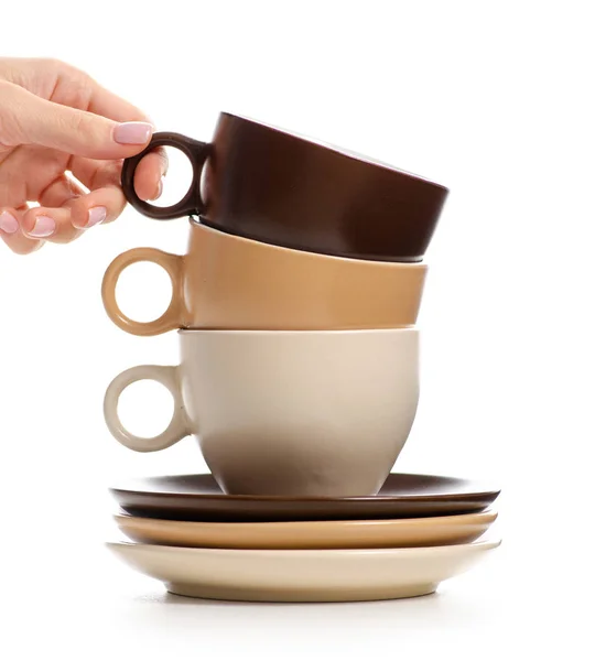 Conjunto de xícaras de café com pires na mão — Fotografia de Stock