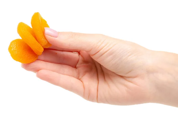 Getrocknete Aprikosen in der Hand — Stockfoto