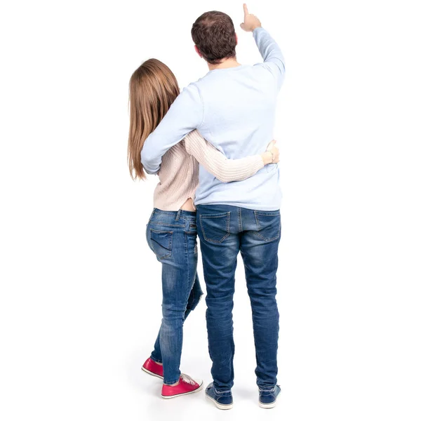 Beautiful woman and man showing back behind — Stock Photo, Image