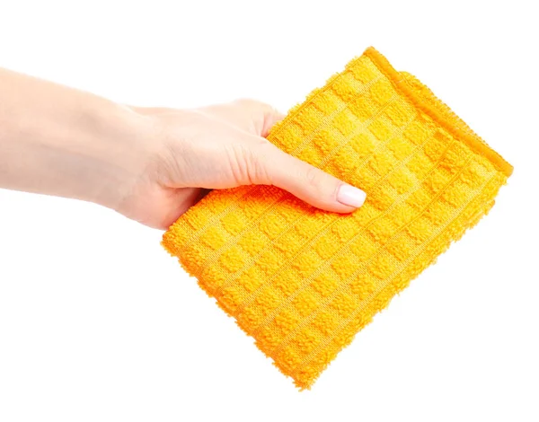 La tela de trapo naranja en la mano — Foto de Stock