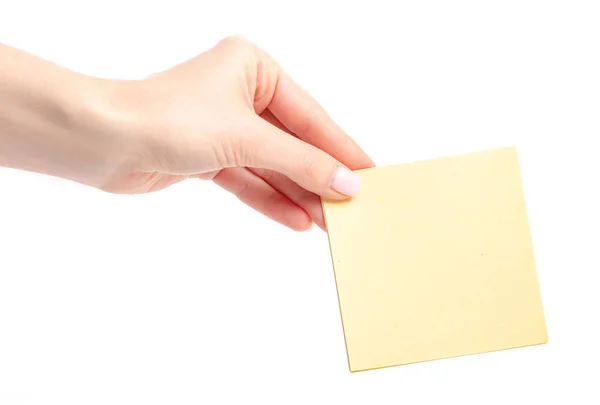 手里的黄色便笺纸 — 图库照片